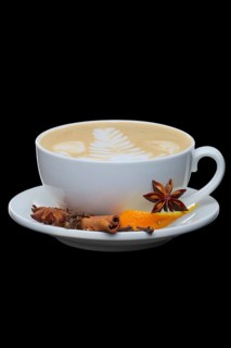 Big cup of cappuccino with orange