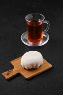 Sweet dessert mochi with coconut chips with fruit tea