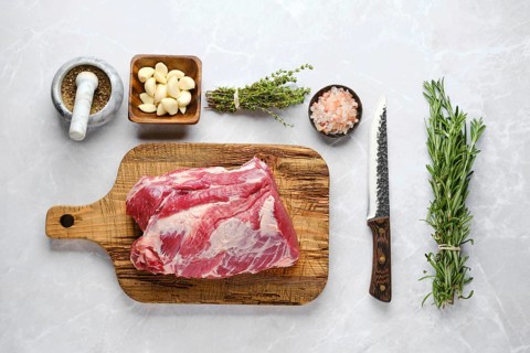 Raw pork neck ready for baking
