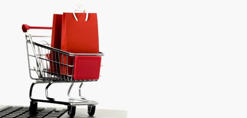 Front view shopping card with bags copy space cyber monday