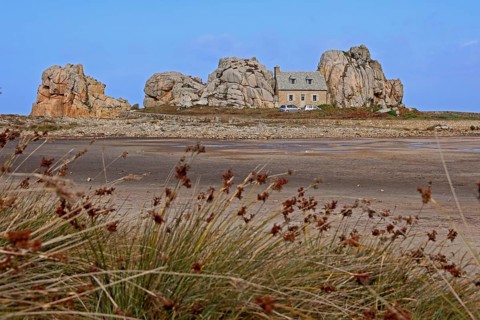 Country house between rocks near Le Gouffre