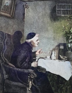 Priest sitting at the table and has caught a bird picking up the cake crumbs