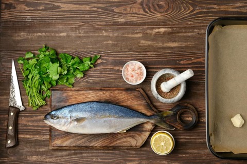 Fresh sea yellow tailed horse mackerel ready for cooking with ingredients