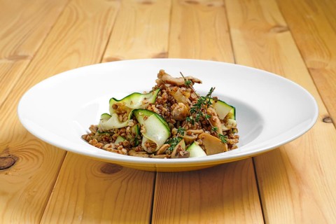 Boiled buckwheat with marinated mushrooms and fresh cucumber