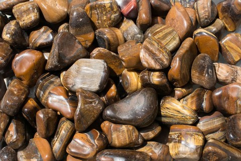Tiger's eye and hawk's eye gemstone as natural mineral rock specimen