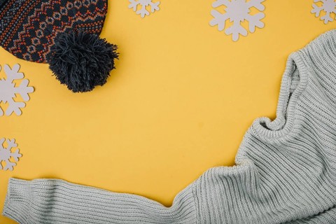 Sweater bobble hat near snowflakes. Resolution and high quality beautiful photo