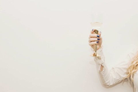 Woman holding glass champagne. Resolution and high quality beautiful photo