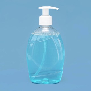 Transparent bottle liquid soap blue background. Resolution and high quality beautiful photo