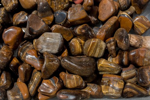 Tiger's eye and hawk's eye gemstone as natural mineral rock specimen