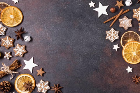 Flat lay gingerbread cookies dried citrus christmas with copy space