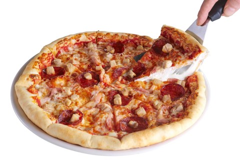 Piece of pizza with melted cheese on skimmer. Melted cheese stretches from the piece