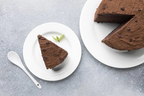 Top view chocolate cake slice with spoon mint. Resolution and high quality beautiful photo