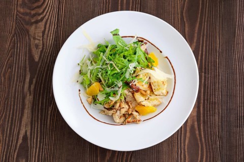 Top view of salad with fried chicken meat