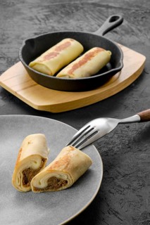 Thin pancakes stuffed with beef meat