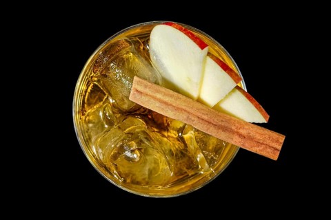Top view of whiskey with apple juice