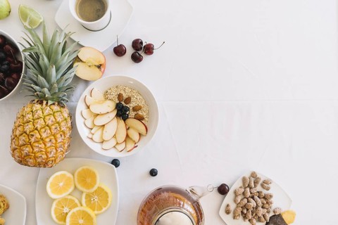 Elevated view fresh healthy breakfast white background