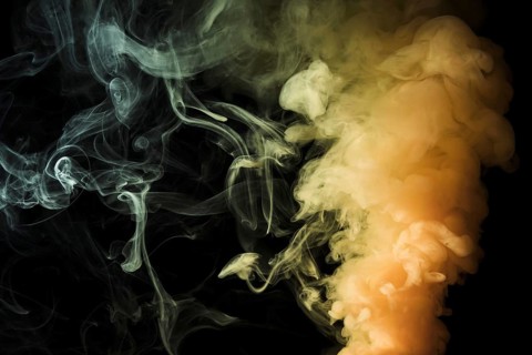 Yellow dense fume smoke abstract black background. Resolution and high quality beautiful photo