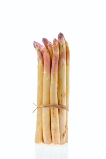 Bunch of asparagus stalks isolated on white background