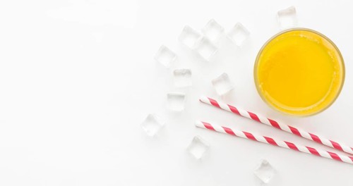 Top view orange juice glass with straws copy space 1. Resolution and high quality beautiful photo