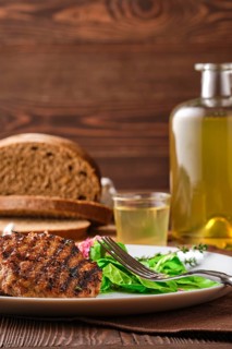 Grilled beef cutlet with fresh salad