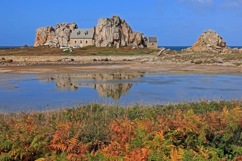 Country house between rocks near Le Gouffre