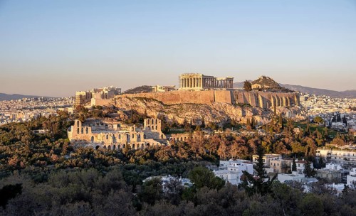 View from Philopappos Hill over the city at sunset