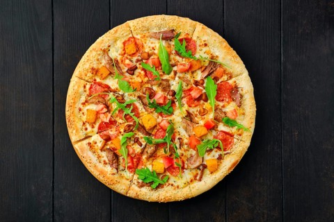 Top view of pizza with pumpkin