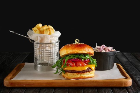 Juicy beef burger with lingonberry sauce