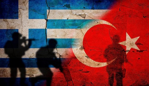 Greece vs. Turkey flag on cracked wall. Concept of war between Turkey and Greece