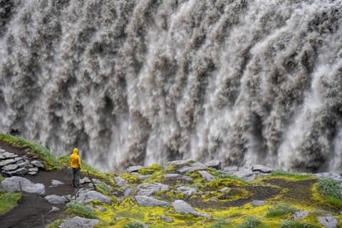 Tourist standing at a canyon