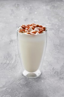 Milkshake with vegetable whipped cream foam