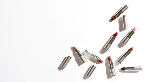Group metallic lipsticks white background