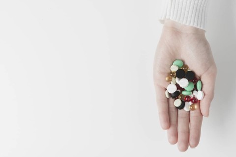 Hand with pile drugs