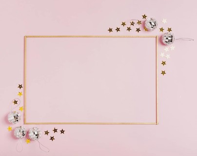 Cute frame with christmas balls pink background