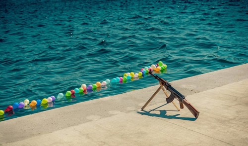 Balloon on a string on water for shooting game