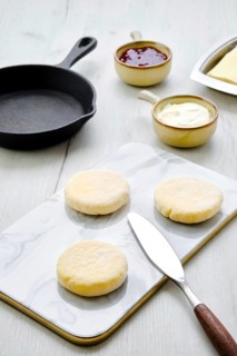 Fresh cottage cheese pancake on marble serving board