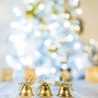 Decorative bells near christmas tree