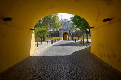 Outer Corner Gate and view over Our Lady of the Conception Hermitage and Chapel on top of the inner gate