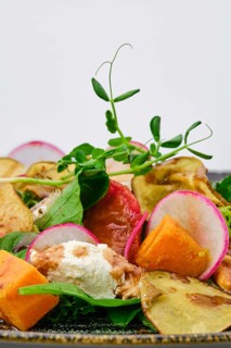 Macro photo of salad with soft cheese
