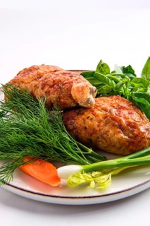 Stuffed chicken thigh decorated with spring onion