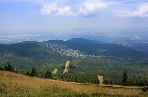 View from the mountains to the city in the background