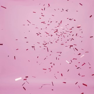 Dark confetti falling pink background