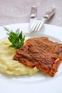 Fried hake fillet with spinach