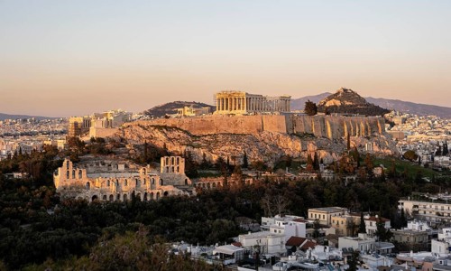 View from Philopappos Hill over the city at sunset