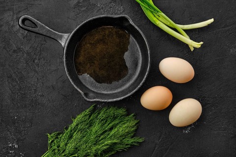 Fresh country eggs and cast iron skillet