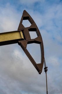 Oil rig before a hotel
