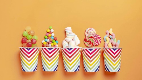 Flat lay delicious colorful candies