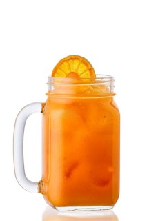 Cold orange lemonade in mason jar isolated on white background