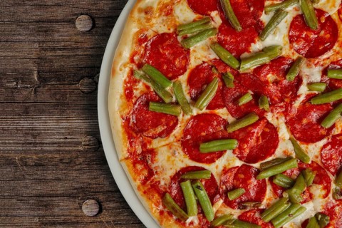 Top view of half of pizza pepperoni