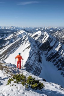Ski tourers at the summit of Sonntagshorn